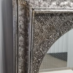 Decorative silver-tone metal mirror